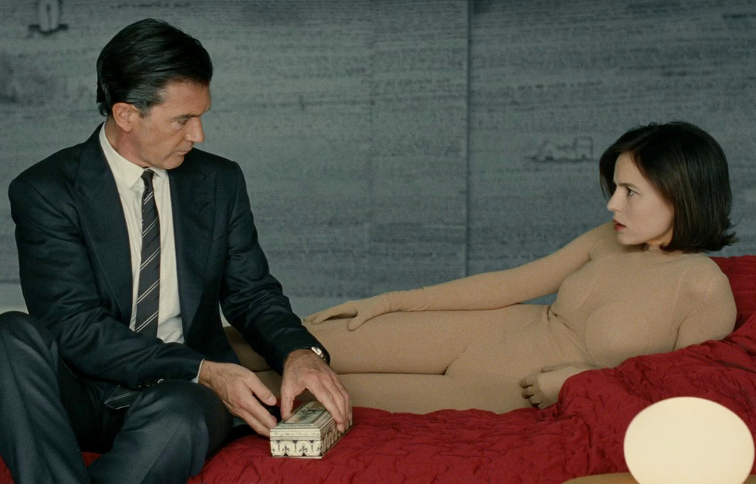 Banderas and Vera on couch